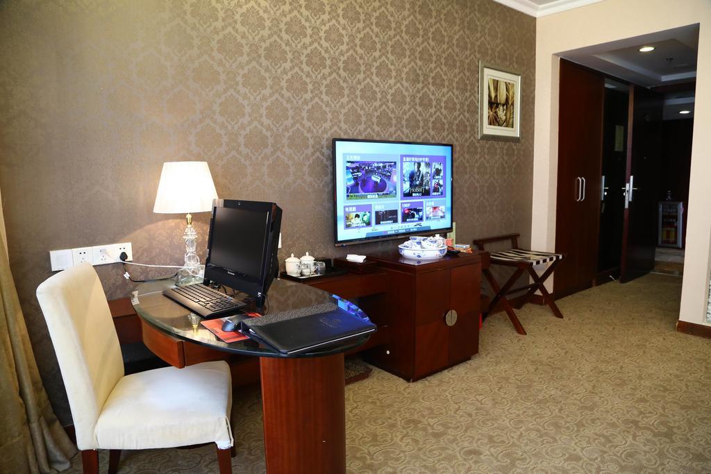 Long Zhou Grand Hotel Kanton Zimmer foto