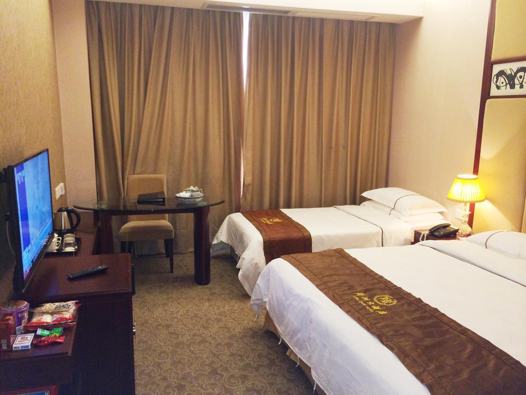Long Zhou Grand Hotel Kanton Zimmer foto