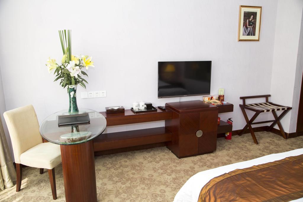 Long Zhou Grand Hotel Kanton Zimmer foto