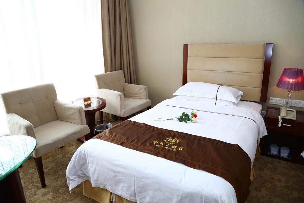Long Zhou Grand Hotel Kanton Zimmer foto