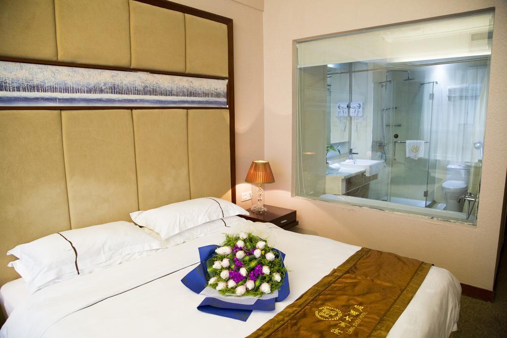 Long Zhou Grand Hotel Kanton Zimmer foto