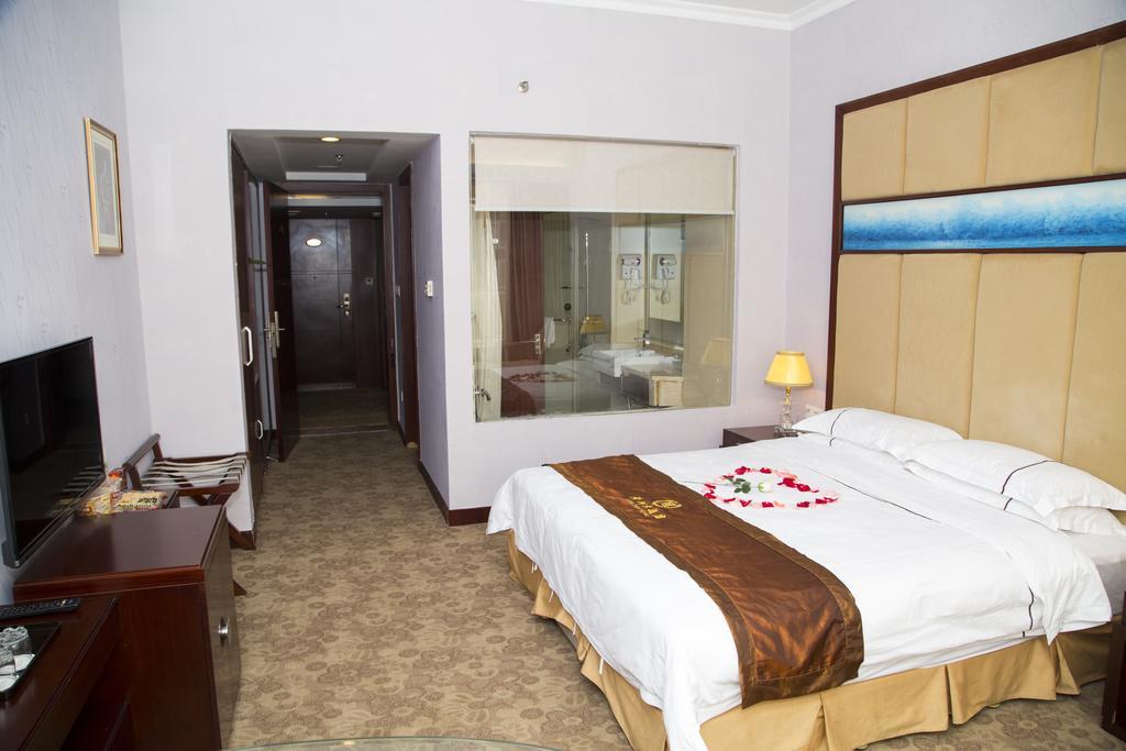 Long Zhou Grand Hotel Kanton Zimmer foto