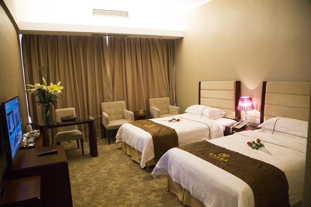 Long Zhou Grand Hotel Kanton Zimmer foto