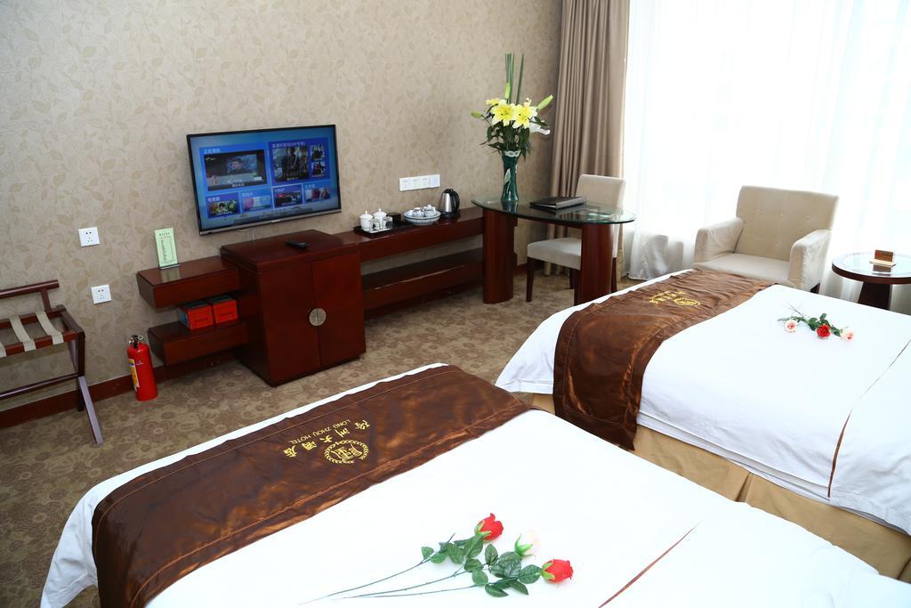 Long Zhou Grand Hotel Kanton Zimmer foto