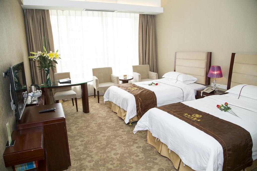 Long Zhou Grand Hotel Kanton Zimmer foto