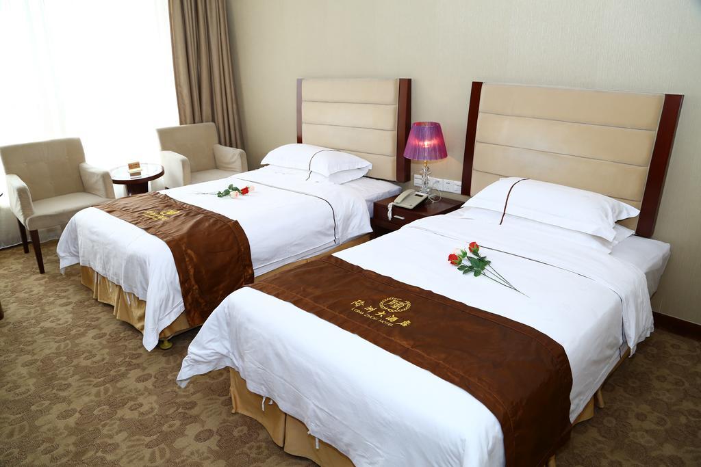 Long Zhou Grand Hotel Kanton Zimmer foto